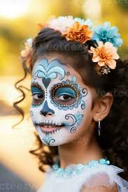 kid in day of the dead makeup with