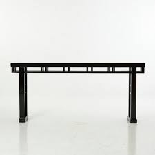 console table in black lacquer wood