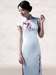 The hair dressing ritual of the bride and the capping ritual of the groom symbolized their initiation into adulthood and were important parts of the wedding preparations. Red Cherry Blossom Floral Embroidered White Wedding Qipao Chinese Wedding Dress Traditional Chinese Wedding Dress Wedding Qipao