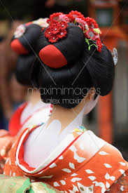 photo of two maiko geishas red kimonos
