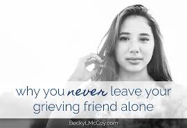 grieving friend alone