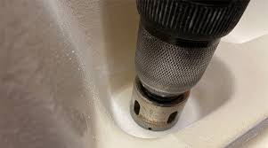 tap hole in a ceramic or granite sink