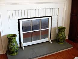 a fireplace screen using a window sash