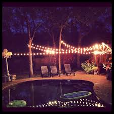 Backyard Party Lights Around The Pool For Engagement Party Backyard Party Lighting Backyard Party Yard Party