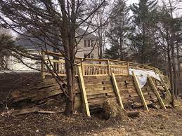 replacing old wood retaining walls with
