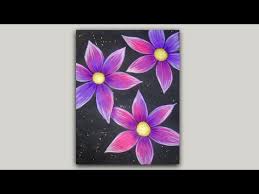 Purple Flowers With A Black Background