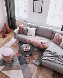 pink living room decor grey couch