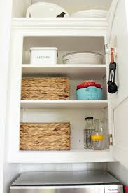 I picked up a few of these kitchen cabinet organizers from walmart, and what a difference they've made! How To Organize Kitchen Cabinets Clean And Scentsible