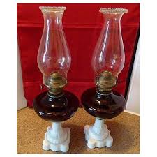 Pair Of Amethyst Glass Oil Lamps With Milk Glass Bases