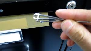 filing cabinet lock with a nail clipper
