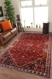 open afghani red vine antique carpet