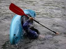 Why do kayakers flip over?