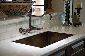 when to choose a wall mount faucet abode