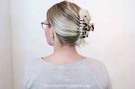 your hair up in a claw clip hairstyle
