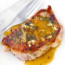 juicy oven baked pork chops with garlic