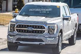 It puts the electric motor on a shortened driveshaft and the battery charging is made by a socket placed on the rear bumper, not exactly a safe area for it to be. 2021 Ford F 150 Spy Shots