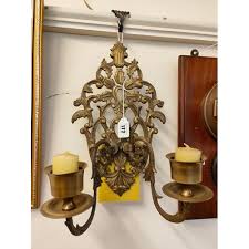 A Brass Twin Branch Candle Wall Sconce