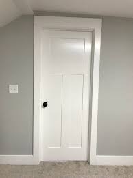 sliding barn door over an opening with trim