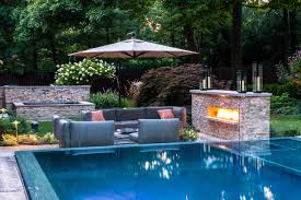 vanishing edge pool patio fireplace