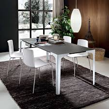 Our collection of white dining tables and black dining tables make for an artful arrangement. Garrick Grey Extending Dining Table Diotti Com