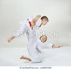 To begin, start in the traditional judo grip and move your right foot so it turns in front and to the inside of your opponent's right foot. Children Are Doing Judo Throws Canstock