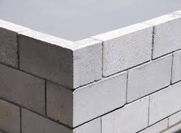 begin block construction on a slab edge