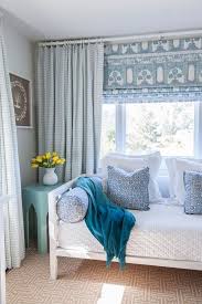 pairing patterned roman shades with