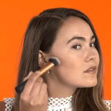 brush bronzing contour powder along the hollows of your cheeks with a brush in small circular movements do the same across your forehead close to the