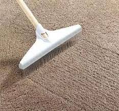 using a carpet rake on your floors