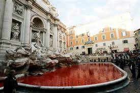 rome s trevi fountain flows red after prank
