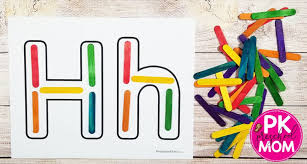 Free printable letter tile mats for teaching kids uppercase and lowercase letter matching and beginning letter sounds. Alphabet Mat Printables Preschool Mom