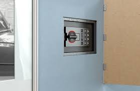 Wall Safe Behind Picture Stock
