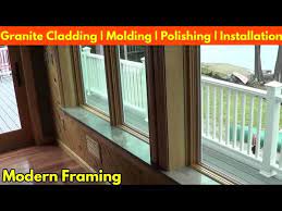 window framing green granite molding