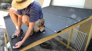 roofing installing tarpaper felt