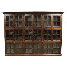 Oak Tudor 18 Door Glass Front Bookcase