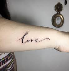 Love forever and heart tattoos design. Cursive Love Tattoo By Fin Tattoos Word Tattoos Love Wrist Tattoo Tattoo Word Fonts