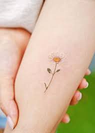 While there is no specific meaning behind the daisy tattoos, a person may have a particular connection with the flower (e.g., favorite flower, relatives' favorite flower). Daisy Tattoo Get An Inkget An Ink