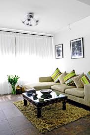 corner sofa with beige striped pillow