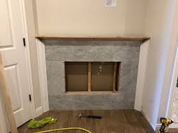 A regular electric fire should include a power supply plug, a remote control, a wall mount or wall bracket, and screws. How To Diy A Built In Electric Fireplace Chris Loves Julia