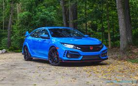 You'll recognize it by its body color grille accents, a bigger grille opening and a little less mesh over some of the fake vents. 2020 Honda Civic Type R Gallery Slashgear