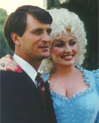Nashville.dear santa, please send me the opening number from dolly parton's christmas on the square so that i may watch and enjoy the. Dolly Parton And Carl Dean A Timeline Of Their 57 Year Relationship
