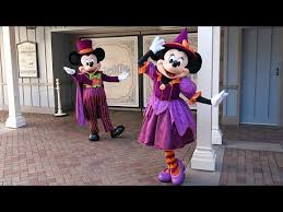 mickey and minnie in halloween costumes