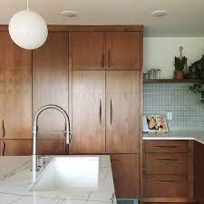 Modern stainless steel appliances are right at home. A Gorgeous Mid Century Modern Kitchen Remodel Architectural Digest