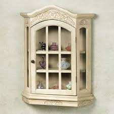 Display cabinet featuring lighting, glass door and appealing , modern design. Fantastic Wall Mounted Curio Cabinet With Glass Doors Wall Curio Cabinet Glass Cabinet Doors Curio Cabinet