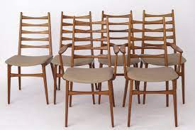 mid century dining chairs in teak