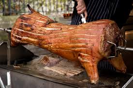 before roasting a pig the pros advise