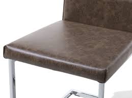 The most common leather dining chairs material is sheepskin. Dining Chair Faux Leather Light Brown Trenet