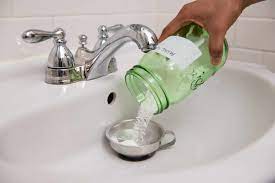 Unclog the kitchen sink with vinegar & baking soda. How To Clean A Clogged Drain With Baking Soda