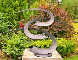 Garden Sculpture And Ornament In Metal