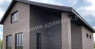 Двухэтажный дом из коричневого кирпича заказать в Рязани